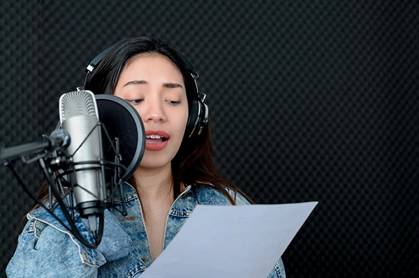Asian,Female,Singer,Singing,In,A,Recording,Studio.,Female,Singer multimedia-translation-services